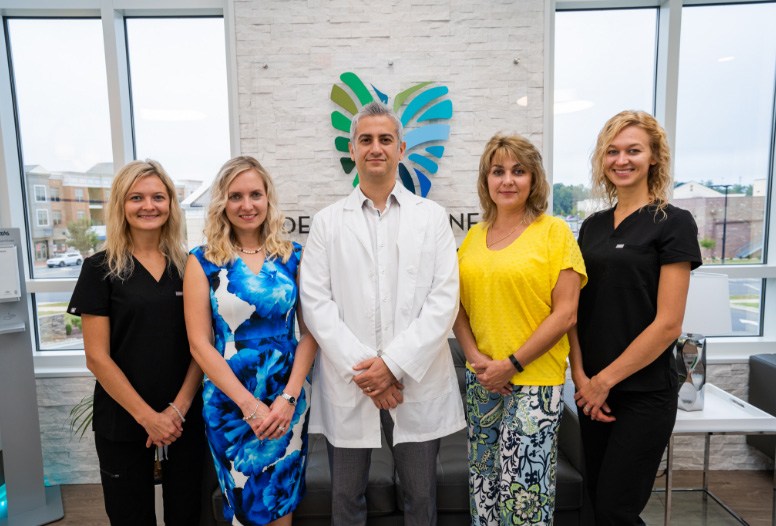 Photo of smiling Dental Wellness of Charlotte team